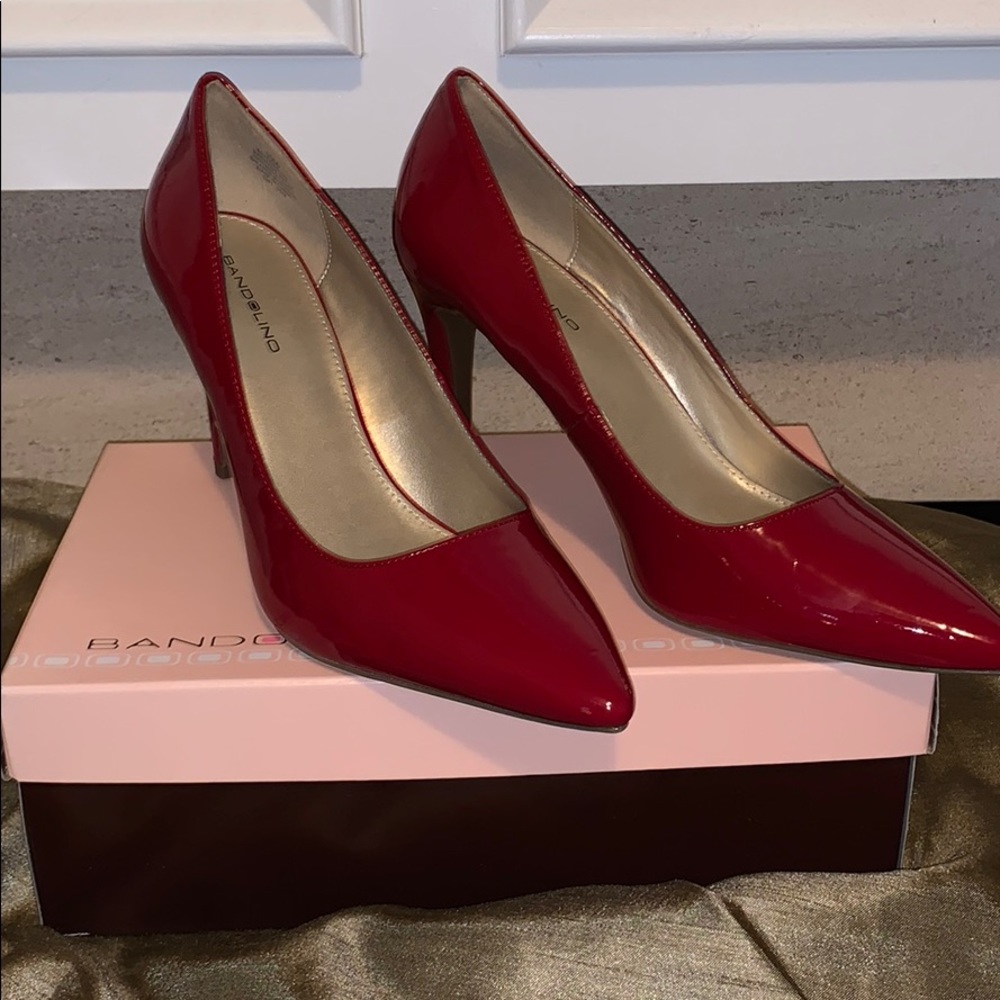 Woman’s red pumps